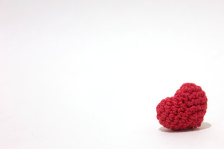 Love crochet in white background. Valentine's day. Symbol of love.の写真素材