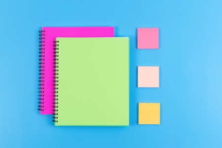 Back to school concept. Colorful stationery on blue background. Copy space.の写真素材