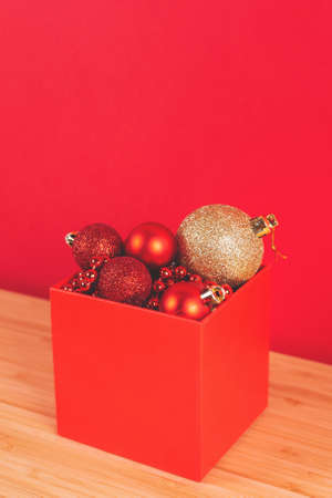 Box of Christmas tree decorations.