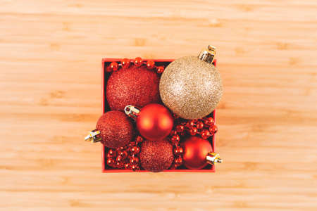Square box with Christmas tree decorations. Top viewの写真素材