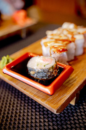 Traditional Asian food sushi on wooden plate.の写真素材
