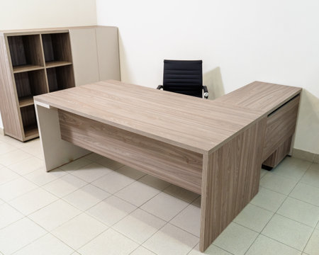 office room interior with desk and armchair. A sample of office furniture in a furniture showroom.の写真素材