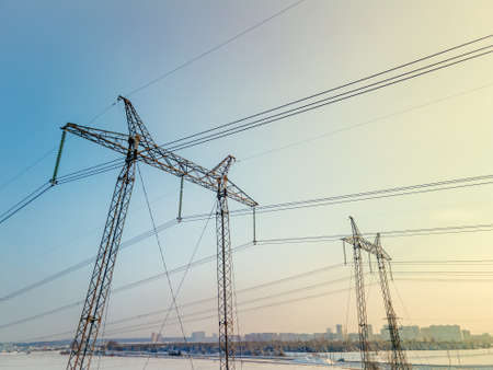 High voltage power lines. High voltage pole, high voltage tower sky at dawnの写真素材