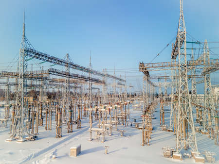 Electrical substation, an electrical installation designed to receive, convert and distribute electrical energy, consisting of transformers in the winter season.の写真素材