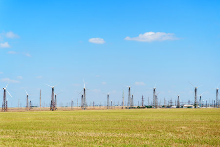 Windmill farm, wind generators on a beautiful bright day.の写真素材