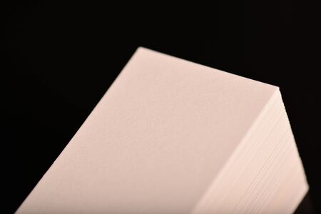White Business Cards, flyer or banner Mockup. Blank empty template of paper cards on black background.の写真素材