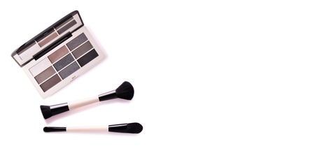 Eyeshadow palette with mirror isolated on white background. Palette of cosmetic eye shadow,...