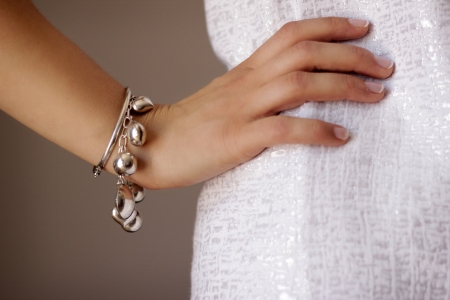 Bracelet jewelry on woman s armの写真素材