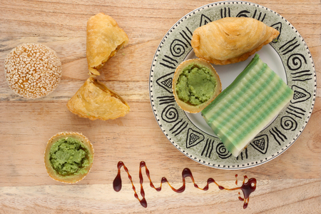 Asian traditional dessert or snack on wooden backgroundの写真素材