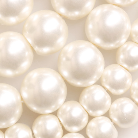 Pile of pearl on the white backgroundの写真素材