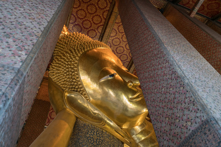 Buddha statue of the Great Reclining Buddha in Wat Pho, Bangkok, Thailandのeditorial素材