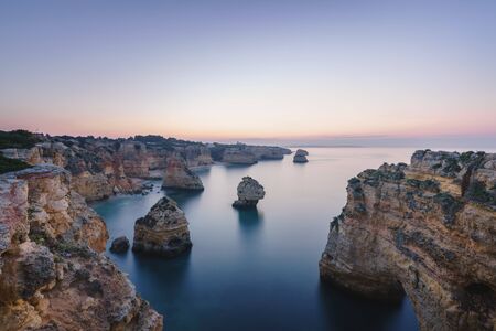 Portuguese coast line in Algarve during the sunrise, Portugalの写真素材