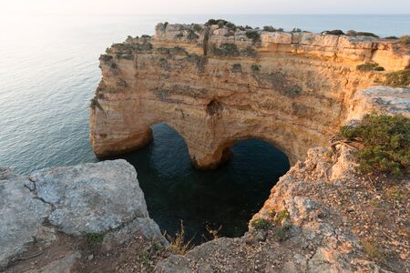 Portuguese coast line in Algarve during the sunrise, Portugalの写真素材