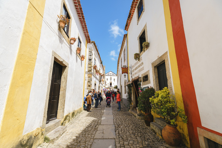 Obidos, Portugal - April 30th 2019: Street and Ancient Buildings and Walls in old Townのeditorial素材