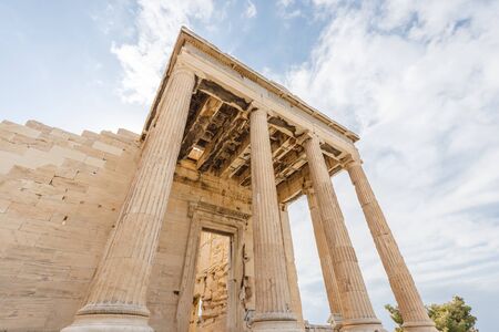 Spectacular sights of the ruins in ancient Greek Acropolis, old temple of parthenon and stone pillar columnsの写真素材