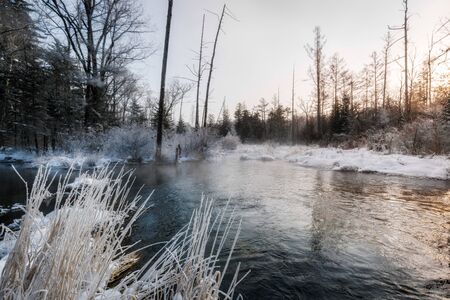 Winter Scenery of Forest, River and Lakes with Ice and snow at Dusk in Changbai Mountain, Jilin Province, Chinaの写真素材
