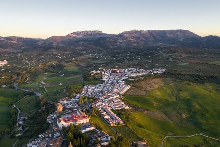 Aerial view of Ronda village, a village with white houses at the edge of cliffside in Andalusia,...