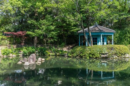 Japanese style garden and lake with a Octagonal Pavilion in Shitennoji Temple in Osaka, Japanのeditorial素材