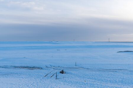 Snowscape in winter in a cloudy dayの写真素材