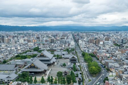 Aerial view of the Kyoto cityscapes during the twilight in a cloudy day, Japanのeditorial素材
