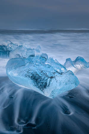 Natural Scenery of Diamond Beach with huge Ice in winter at dusk, Iceland
