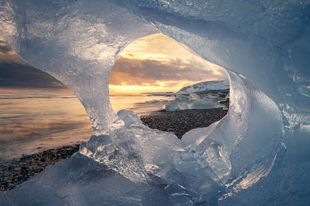 Natural Scenery of Diamond Beach with huge Ice in winter at dusk, Icelandの写真素材