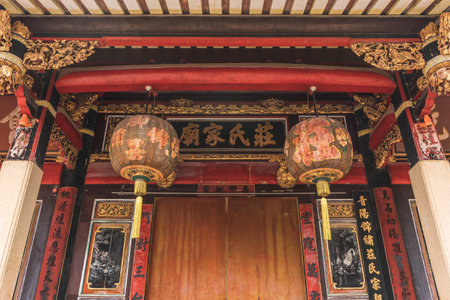 Traditional ancient architecture in southern China, Zhuang Family Temple in Wudian City, Quanzhou with lanterns at the gateのeditorial素材