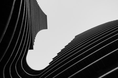 Black and White, low angle view of modern city office building exteriorの写真素材