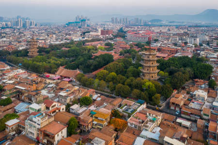 Aerial view of Kaiyuan Temple, the largest buddhist temple in Fujian Province, and West Street at dusk in Quanzhou, Chinaの写真素材
