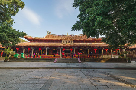 Historical buildings with red Chinese traditional lanterns in Kaiyuan Temple at sunrise in Quanzhou, Chinaのeditorial素材