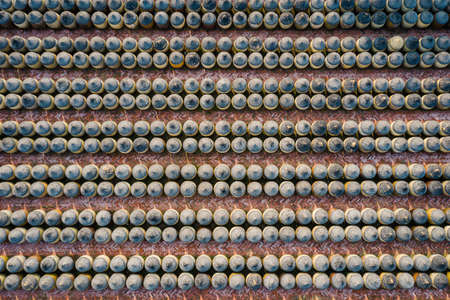 Traditional soy sauce factory, aerial view of the fermented field with numbers of earthen jars on the ground, where soya beans are fermented to produce the soy sauce which is used in Chinese cookingの写真素材