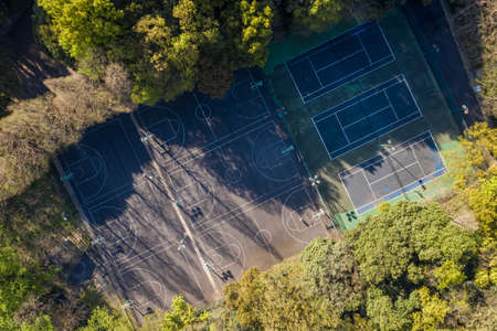 Aerial photography of basketball courts and playgrounds in the woodsの写真素材