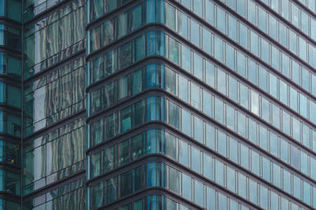 Glass window wall background of a modern city high-rise buildingのeditorial素材