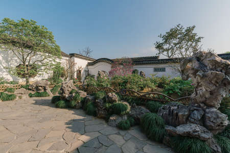 Landscape and buildings in Master of the Nets Garden, a classical Chinese garden in Suzhou, China