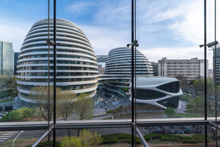 Aerial view of the Galaxy SOHO in Beijing at duskのeditorial素材