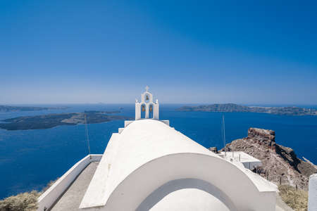 Traditional white buildings and rooftops in the villages of Santorini Island in Greeceの写真素材