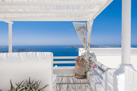 Traditional white buildings and rooftops in the villages of Santorini Island in Greeceの写真素材
