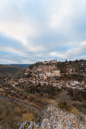 Aerial view of an ancient french village and its castle on cliff, Rocamadour at duskのeditorial素材