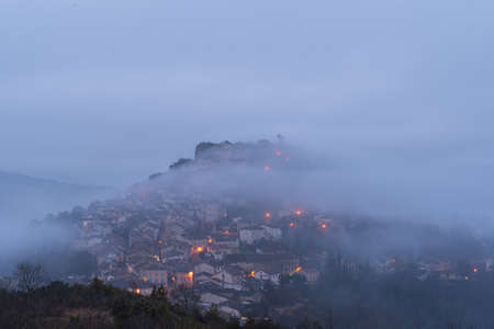 The fortified medieval town of Cordes sur Ciel in Occitanie at sunrise with