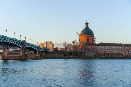 Garonne river and Dome of the 'Hopital de la Grave' at dusk in Toulouse, Franceのeditorial素材