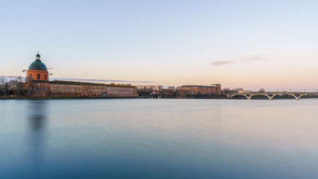 Garonne river and Dome of the 'Hopital de la Grave' at dusk in Toulouse, Franceのeditorial素材