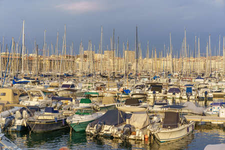 Boats in the old port and modern buildings in Marseille, France