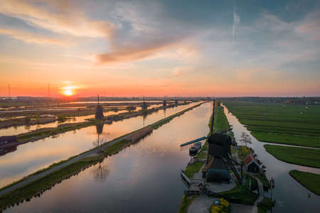 Werelderfgoed Kinderdijk Molens, Aerial view of Ancient Windmills at dusk in Kinderdijk in Netherlandsの写真素材