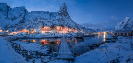 Natural landscapes in winter at dusk in Reine village, one of the most popular village in Lofoten Islands, Norwayの写真素材