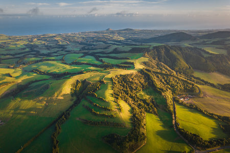 Aerial view of the landscapes on Sao Miguel Island, green farmland and volcanic mountains and lakes, Azores, Portugalの写真素材