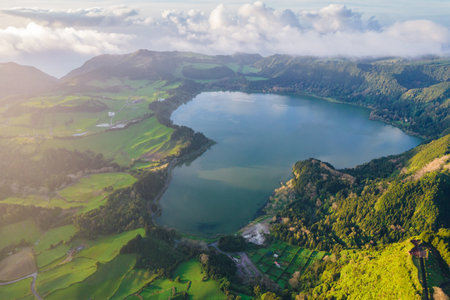 Aerial view of the landscapes on Sao Miguel Island, green farmland and volcanic mountains and lakes, Azores, Portugalの写真素材