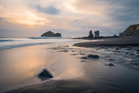 Seascapes at sunset, with rocks on the sea surface. Mosteiros Beach on Sao Miguel Island, Azores, Portugalの写真素材