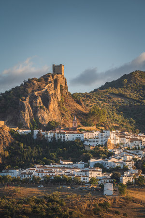 Sunset landscapes of Zahara de la Sierra, an ancient village on the mountain with an ancient castle in Cadiz, Spainの写真素材