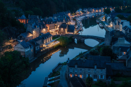 Dinan city at dusk, old port and historic village in Dinan, Franceの写真素材