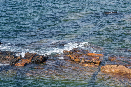 Natural landscape of the rocky beach and seascape along the Brittany coastline, CÃ´te de granite rose or Pink Granite Coast in Franceの写真素材